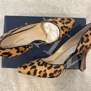 Anne Klein dorsay cheetah print pumps.